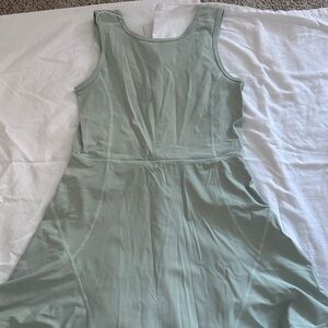 Sleeveless green athletic dress